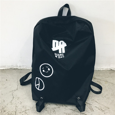 Ежедневна мъжка раница с апликации в черен и бял цвят