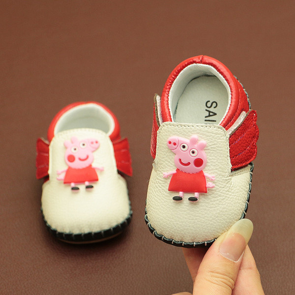 Бебешки обувки в два цвята с цветна апликация