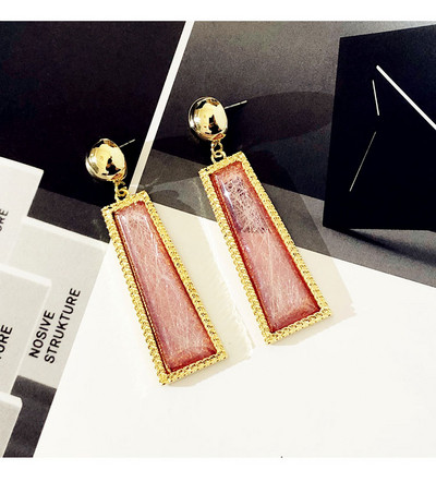 Hosszú, rózsaszínű női fülbevaló