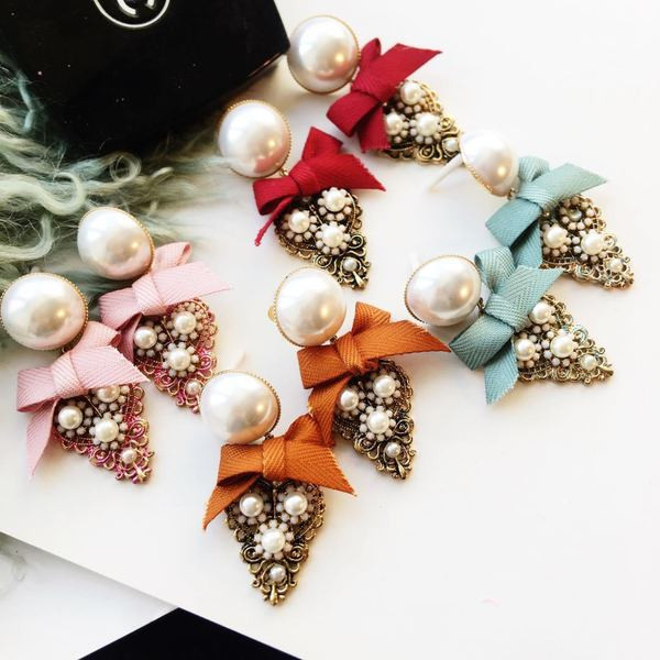 Női fülbevaló szalaggal és díszkövekkel több színben