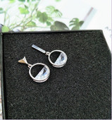 Két színű női fülbevaló kerek formában