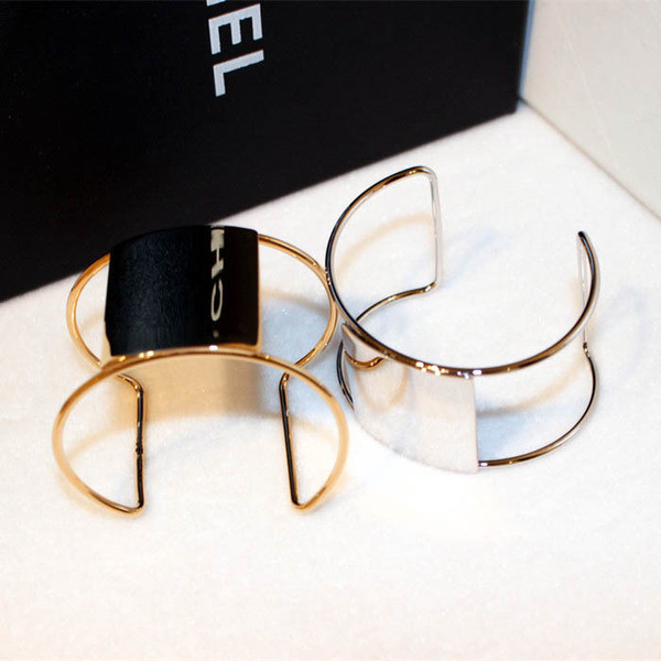 Bratara de dama din metal de culoare auriu si argintiu