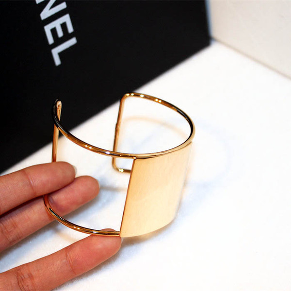 Bratara de dama din metal de culoare auriu si argintiu