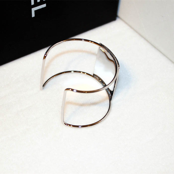 Bratara de dama din metal de culoare auriu si argintiu