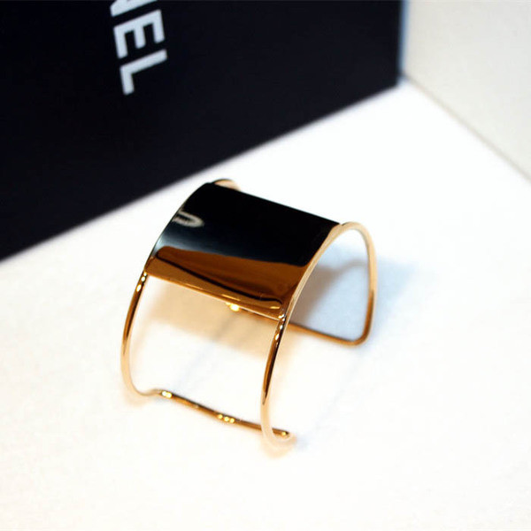 Bratara de dama din metal de culoare auriu si argintiu