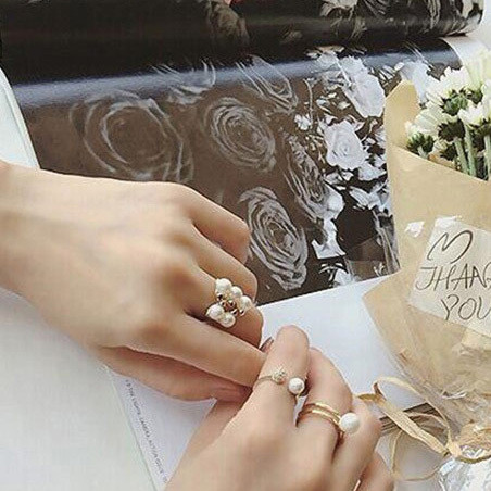 Három női gyűrűből álló szett arany színű dekorgyöngyökkel