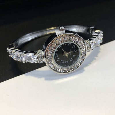 Ceas elegant de dama cu pietre decorative de culoare argintie