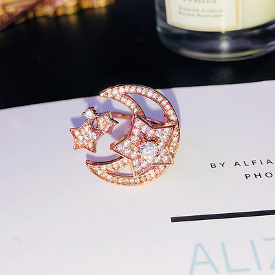 Дамски модерен пръстен с малки декоративни камъни в два цвята