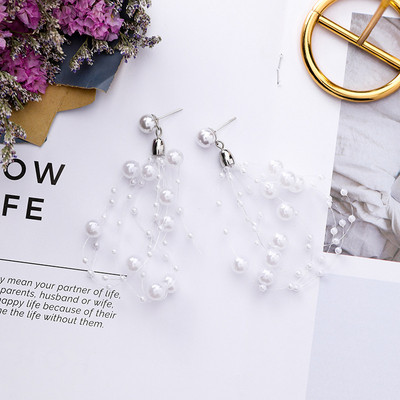 Könnyű női fülbevaló gyöngyökkel