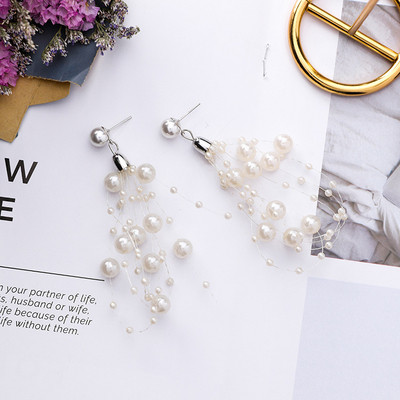 Könnyű női fülbevaló gyöngyökkel