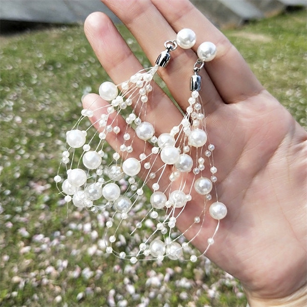 Könnyű női fülbevaló gyöngyökkel