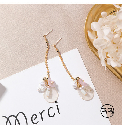 Diferite modele de cercei de dama de culoare deschisa