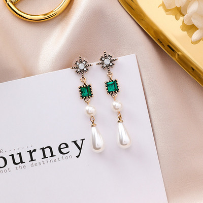 Дамски обеци с камъни и перли