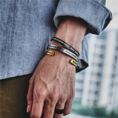 Stylish men`s bracelet with an inscription in three colors