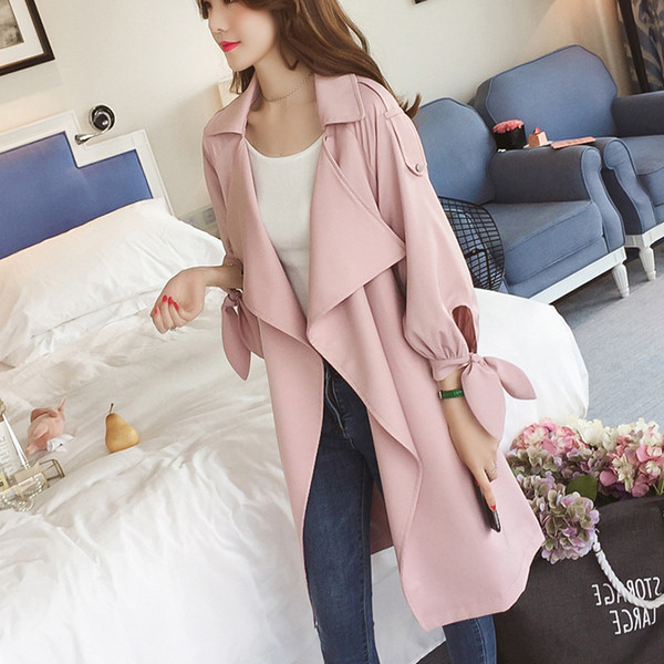 Модерно дамско палто в няколко цвята с елемент с панделки 