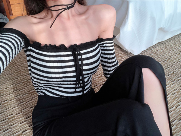 Bluză de damă în dungi, cu mâneci căzute și cravate