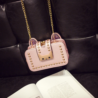 Modern női táska fém csattal, hosszú füllel több színben