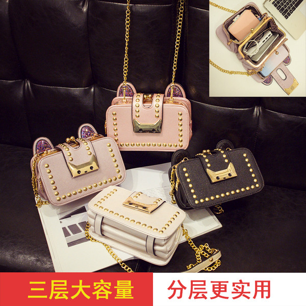 Modern női táska fém csattal, hosszú füllel több színben