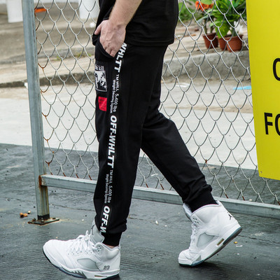 Férfi széles mintás nadrág felirattal és nyomattal több modellben