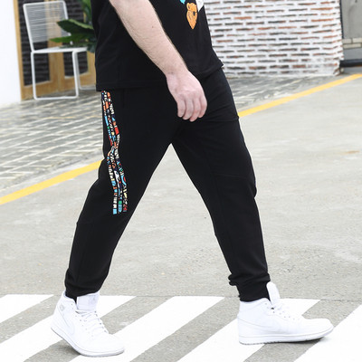 Férfi széles mintás nadrág felirattal és nyomattal több modellben