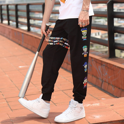 Férfi széles mintás nadrág felirattal és nyomattal több modellben