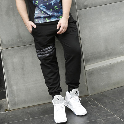 Férfi széles mintás nadrág felirattal és nyomattal több modellben