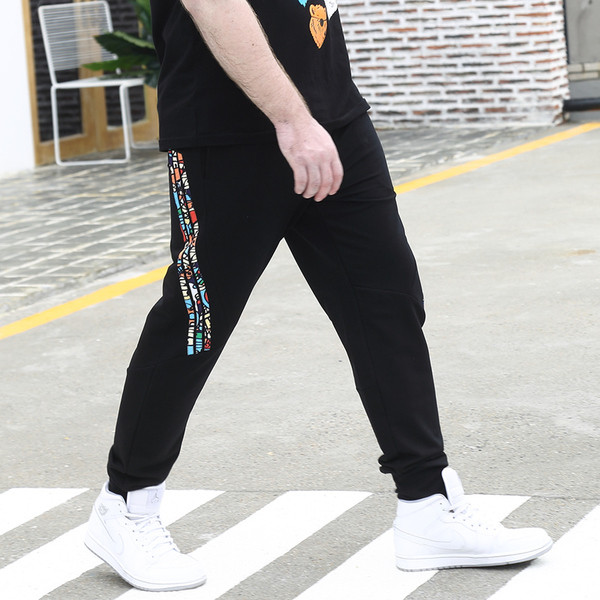 Férfi széles mintás nadrág felirattal és nyomattal több modellben