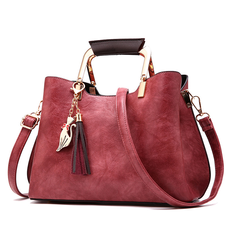 Geanta eleganta cu maner metalic