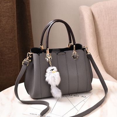 Geanta de dama moderna cu maner lung