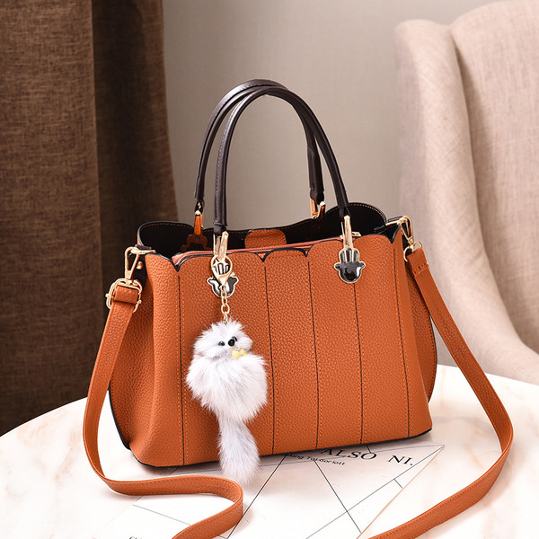 Geanta de dama moderna cu maner lung