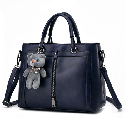 Modern bőr kézitáska több színben