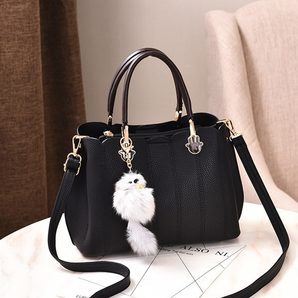 Modern bőr kézitáska több színben