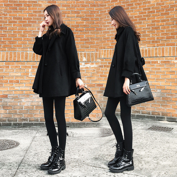 Μοντέρνο χειμερινό παλτό σε μαύρο χρώμα