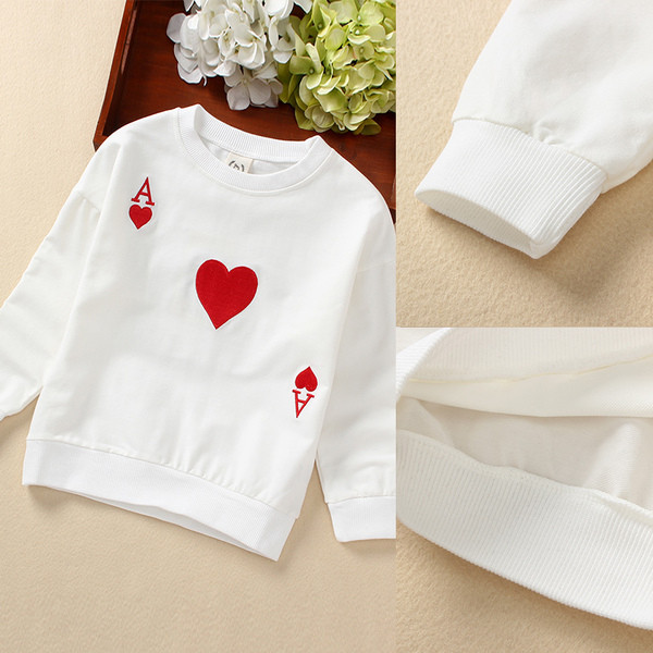 Alkalmi gyerekblúz színes rátéttel, fekete-fehérben