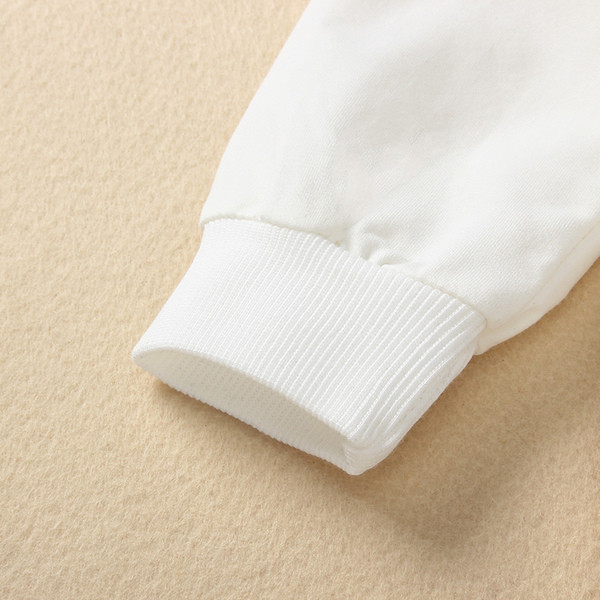 Alkalmi gyerekblúz színes rátéttel, fekete-fehérben