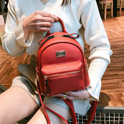 Kis női hátizsák külső zsebbel több színben