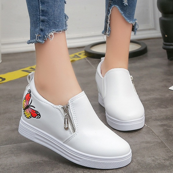 Női alkalmi mokaszinok cipzárral és hímzéssel fehér és fekete színben