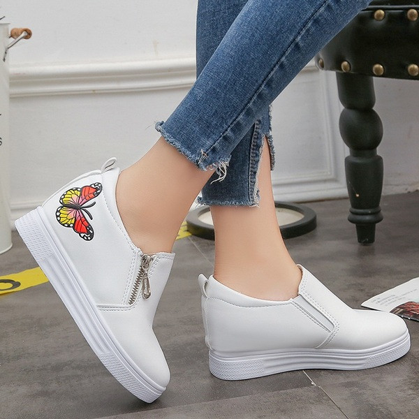 Női alkalmi mokaszinok cipzárral és hímzéssel fehér és fekete színben