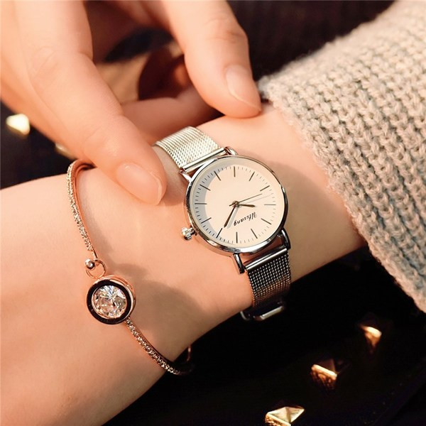 Stílusos női karóra több színben, fém szíjjal