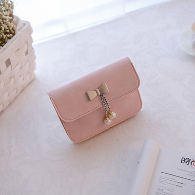 Stílusos női táska hosszú füllel