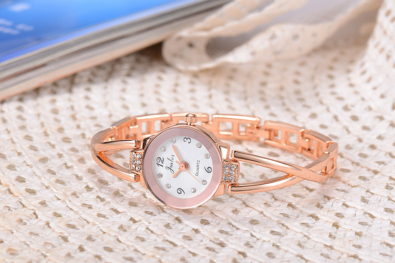 Ceas elegant de dama cu pietre decorative in doua culori