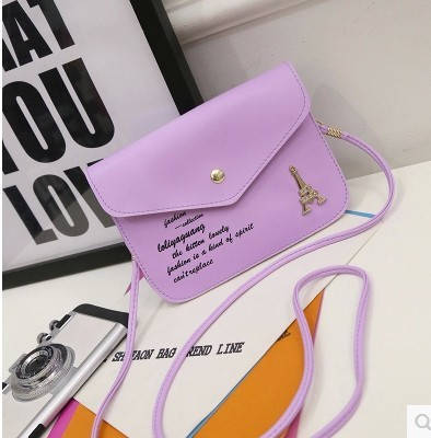 Kis női táska fém csattal több színben