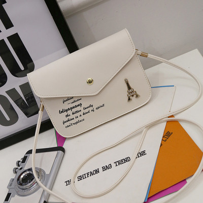 Kis női táska fém csattal több színben