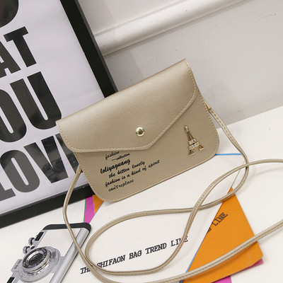 Kis női táska fém csattal több színben