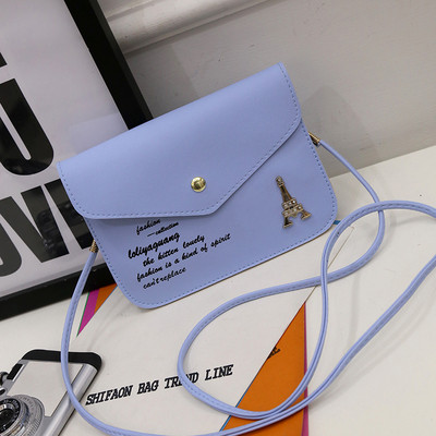 Kis női táska fém csattal több színben