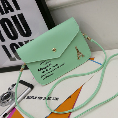 Kis női táska fém csattal több színben