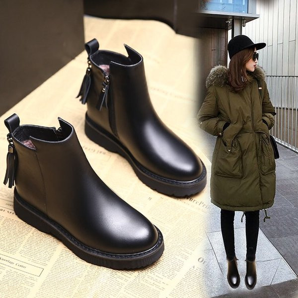 Γυναικείες δερμάτινες μπότες σε μαύρο χρώμα