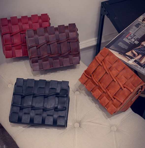 Női táska hosszú bőr fogantyúval