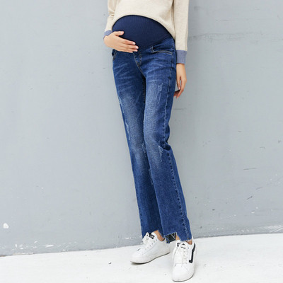 Модерни дънки за бременни жени с разкъсани мотиви - широк модел