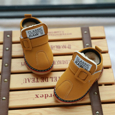 Winter children`s shoes for a boy made of eco leather in three colors
